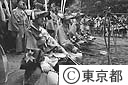 流鏑馬の装束を付けて、乗馬の順番を待つ、武者