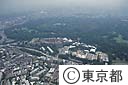 代々木公園と国立オリンピック記念青少年総合センター建設中（空撮）